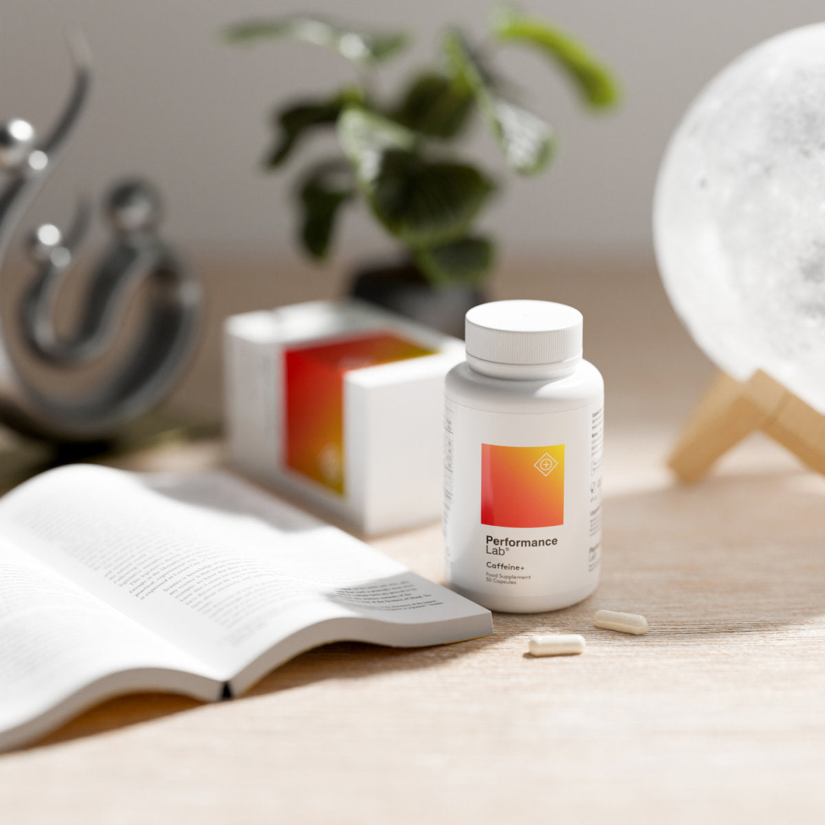 image of Caffeine+ bottle sitting on a table