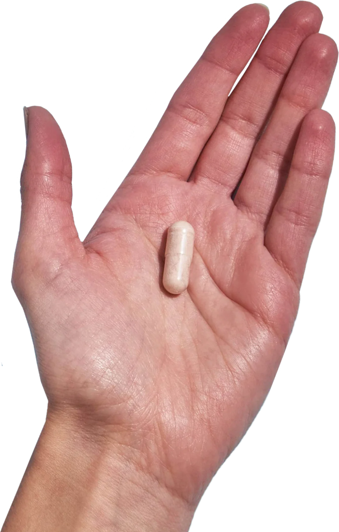 image of hand holding 1 Performance Lab® UK Selenium capsule